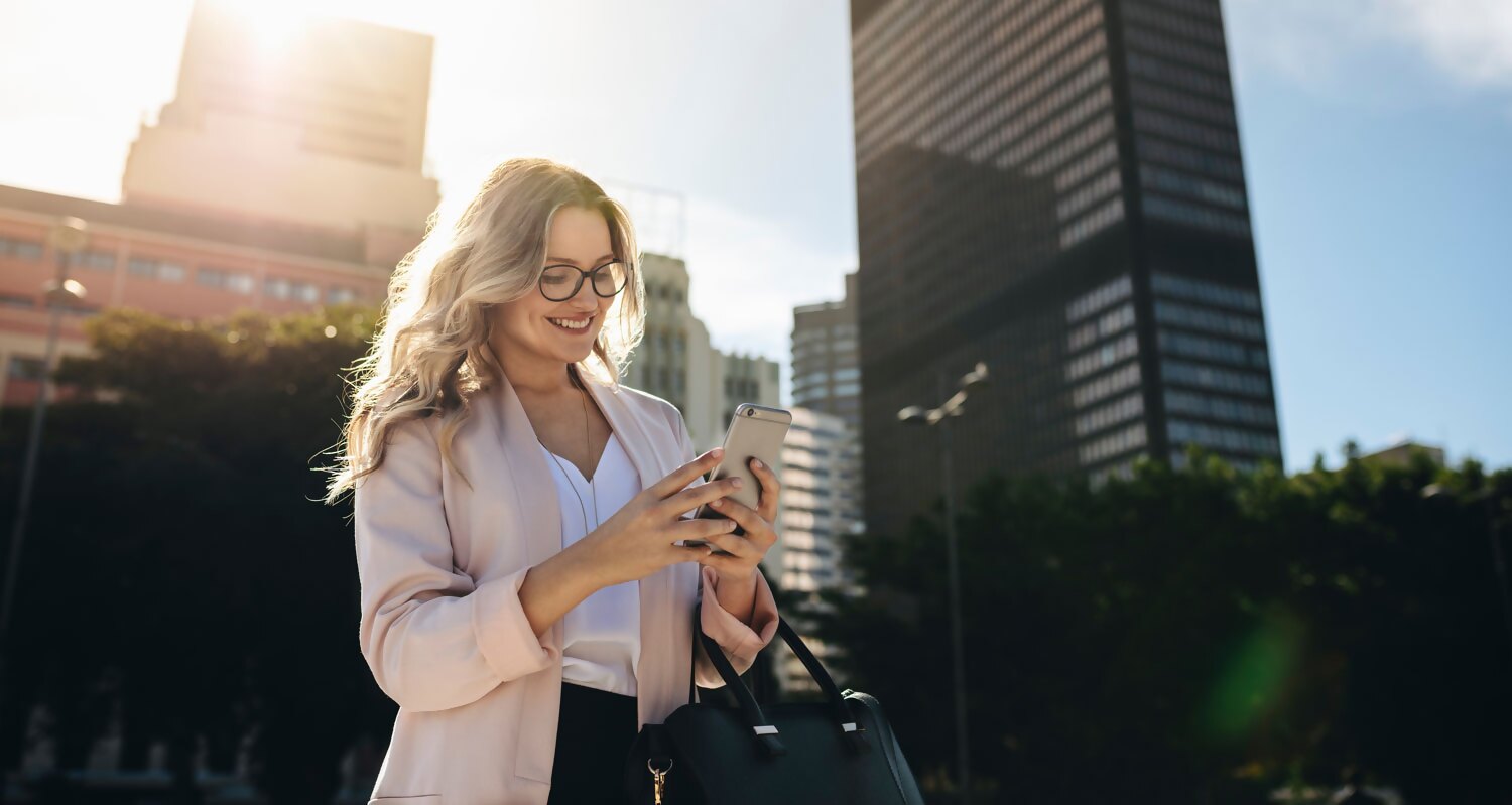 Professional investor communicating with IBKR via social media on their smartphone